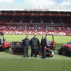 Tony Sinclair, MUFC grounds manager, centre, with Peter McGreevy, Cheshire Turf Machinery, left, and Nigel Lovatt, Lely UK, right, with the new Toros at Old Trafford