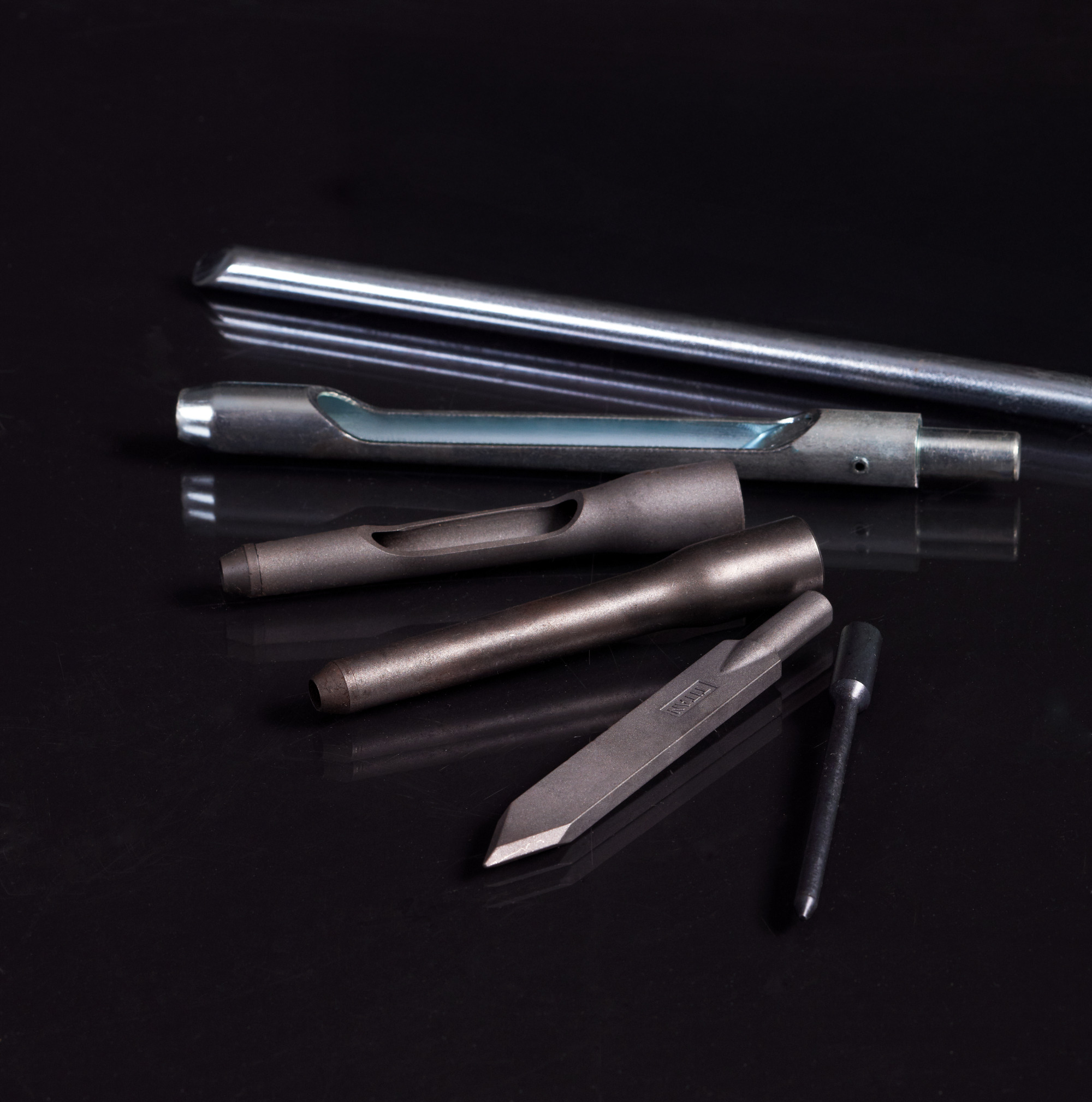 Close-up of Toro aerator tines showing durable steel design for precision turf aeration and professional greenkeeping.