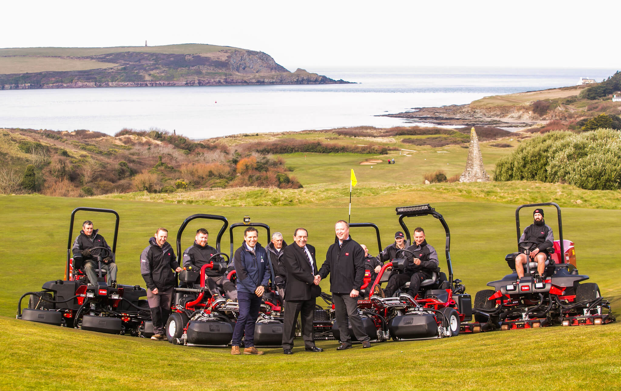 New Toro fleet at St Enodoc Golf Club with the course and sea in the background
