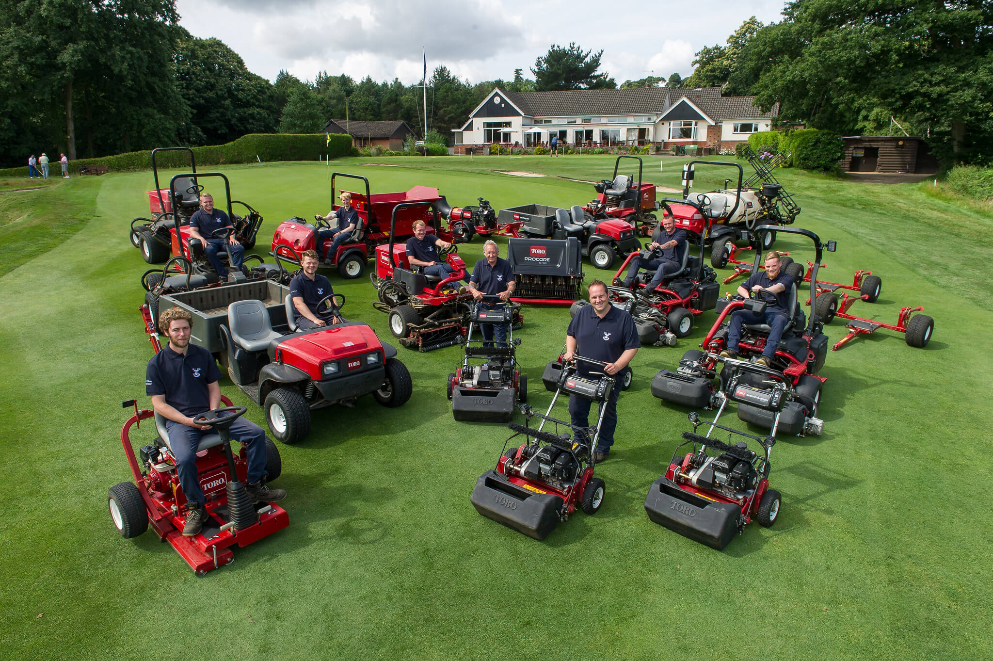 Toro machinery fleet at Stoneham Golf Club in front of club house