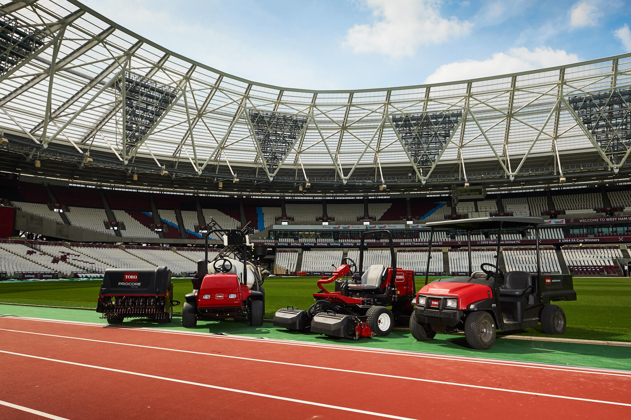 Lineup of Toro grounds machinery at London Stadium