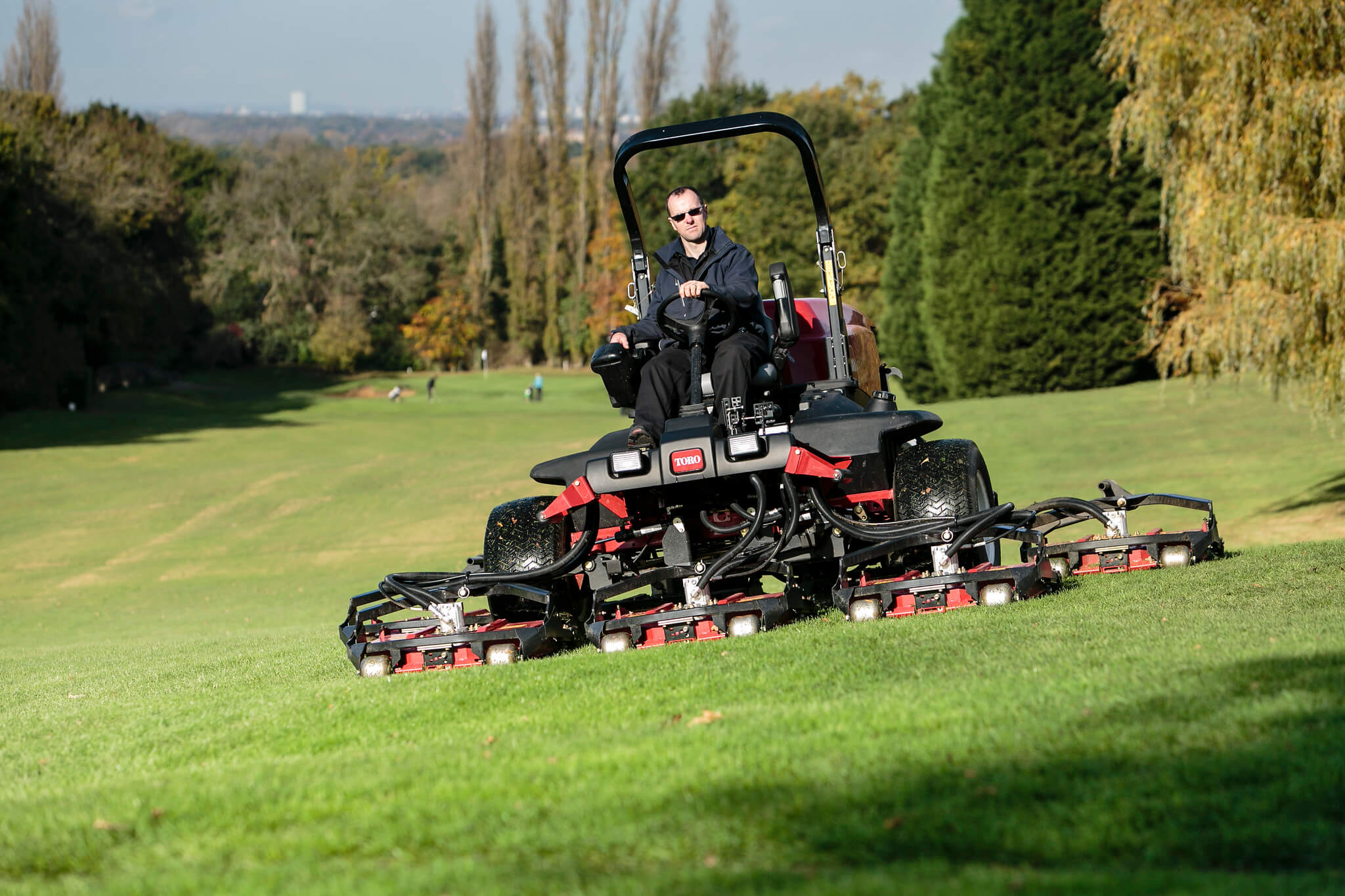 Toro ride-on mower on the greens at Surbiton Golf Club