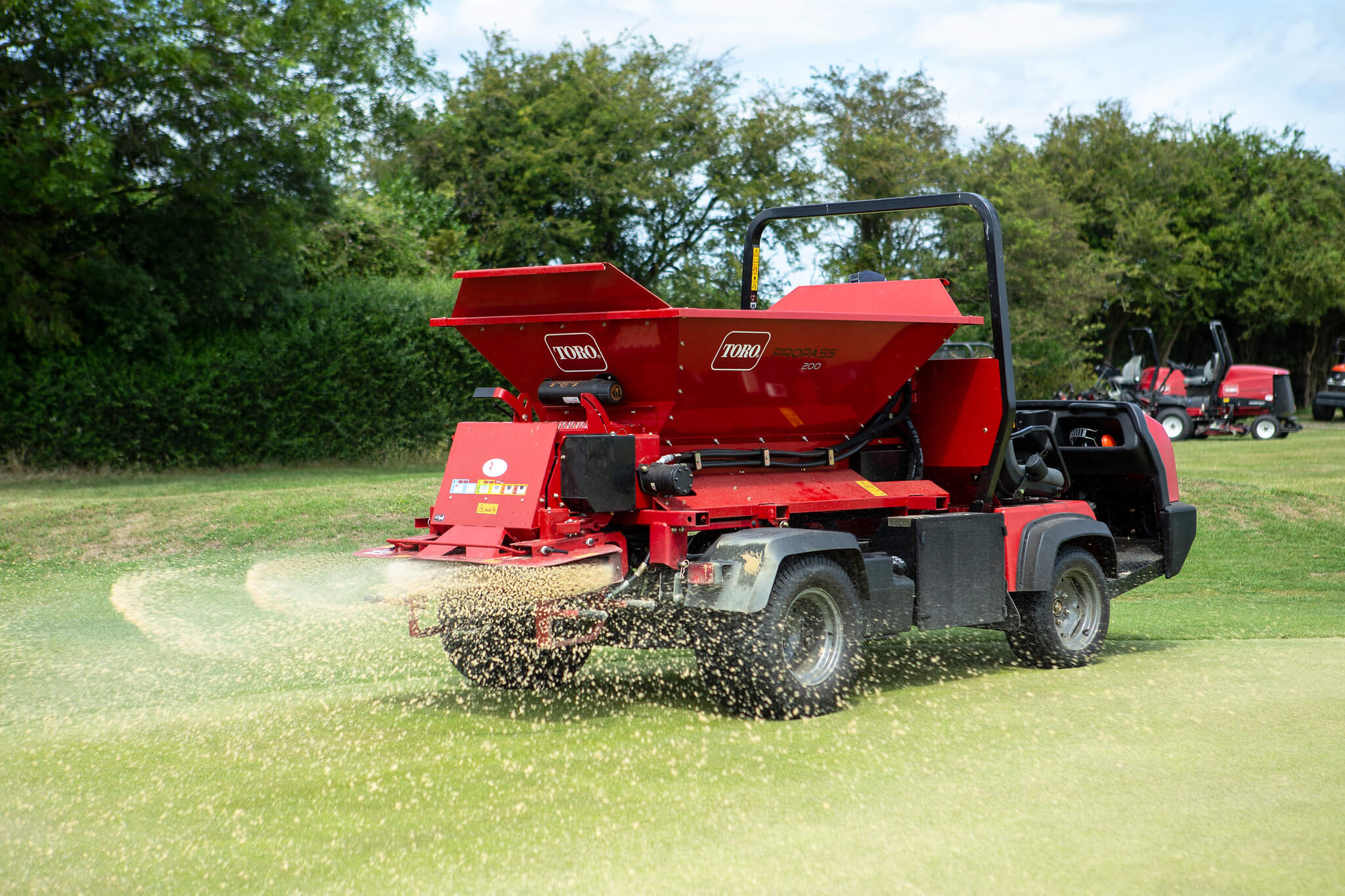 Toro topdresser spreading sand at Sheerness Golf Club