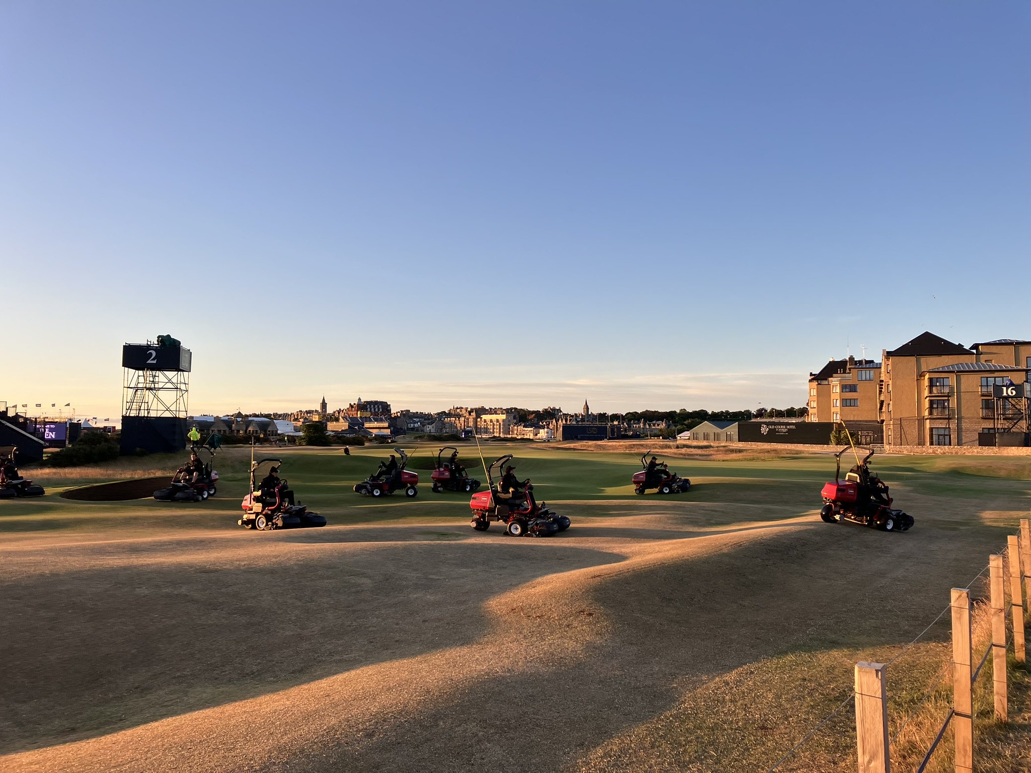 Toro mowers on the greens early morning at St Andrews Links