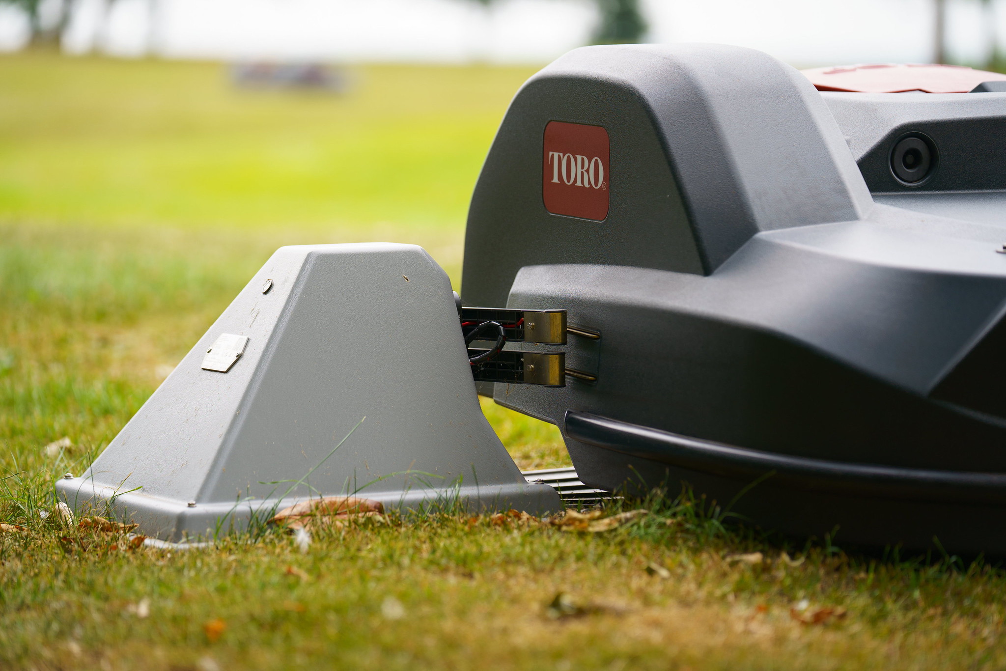 A Toro Turf Pro robot mower self-charges