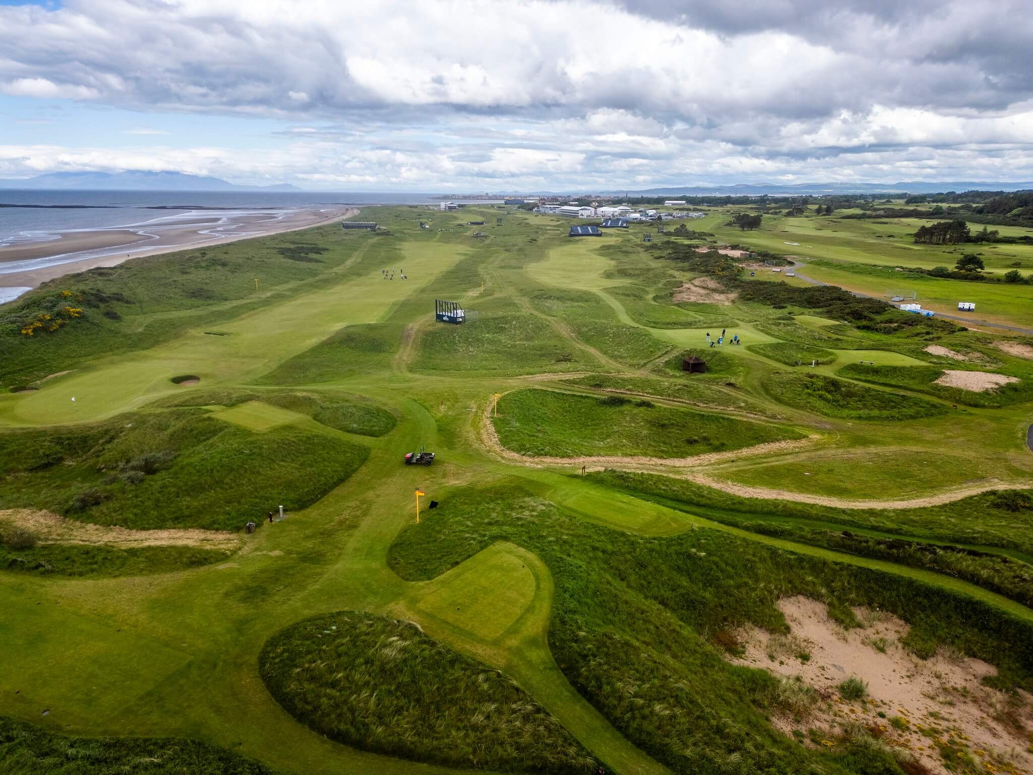Aerial view of Royal Troon golf course with Toro machinery on the course.