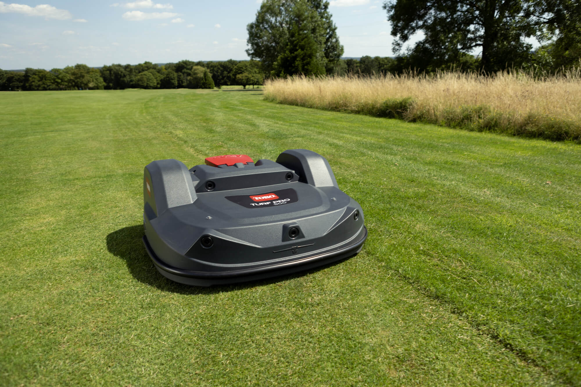 Toro Turf Pro 500 mower on a golf course with grass mowing pattern visible in the background.