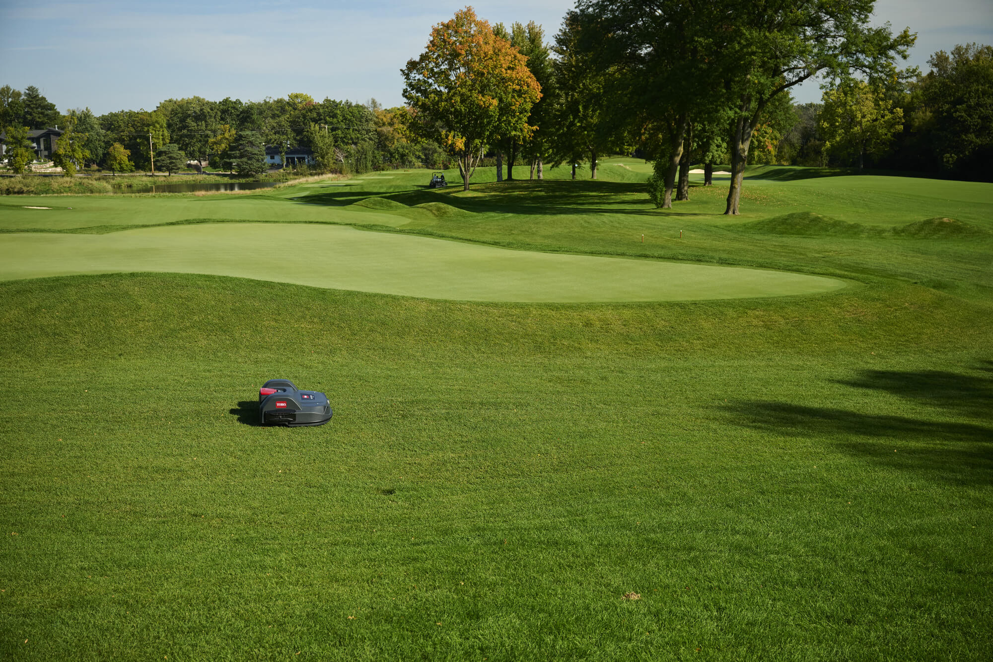 A Toro Turf Pro robot mower on a golf course.