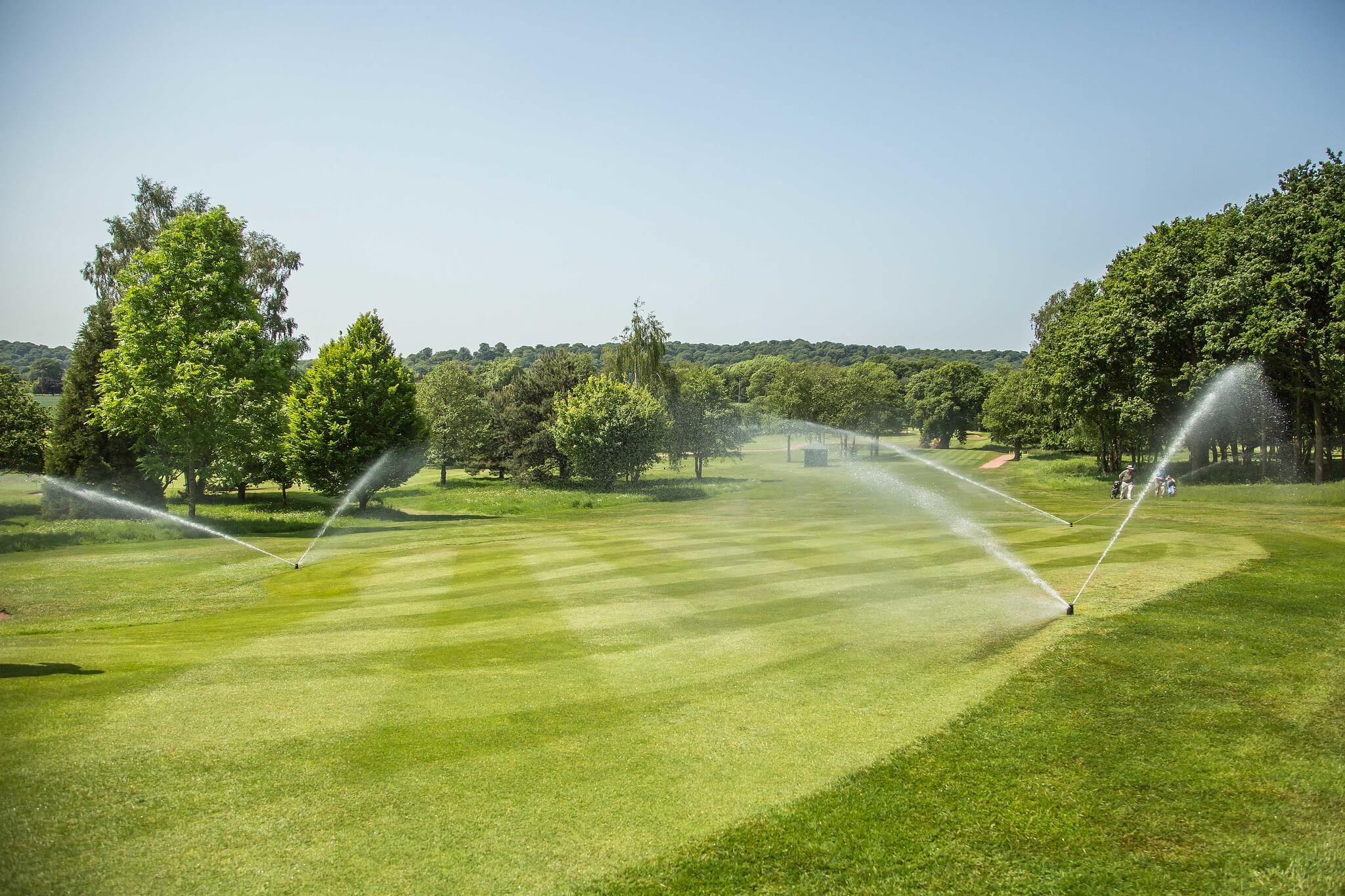Toro irrigation sprinklers on a golf course.