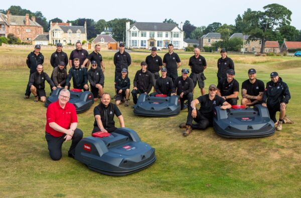 Gullane golf club greenkeepers with Course Manager and Reesink Scotland Branch Manager on golf course with four Turf Pro 500 robotic mowers.