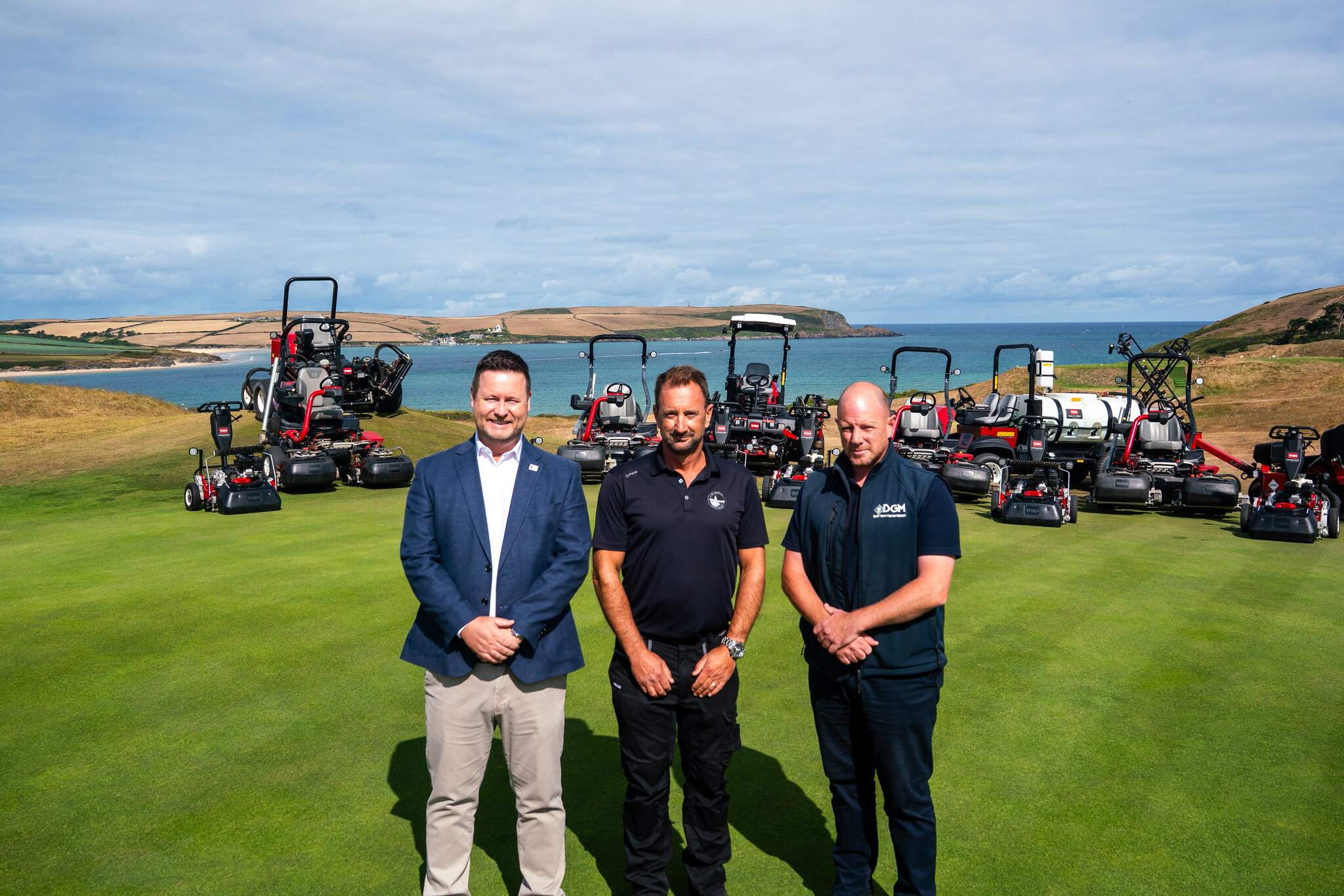 Head Greenkeeper William Smith, centre, with Reesink’s Darren Anderson, left, and Rob Read at DGM, with some of the Toro machinery involved in the fleet deal.