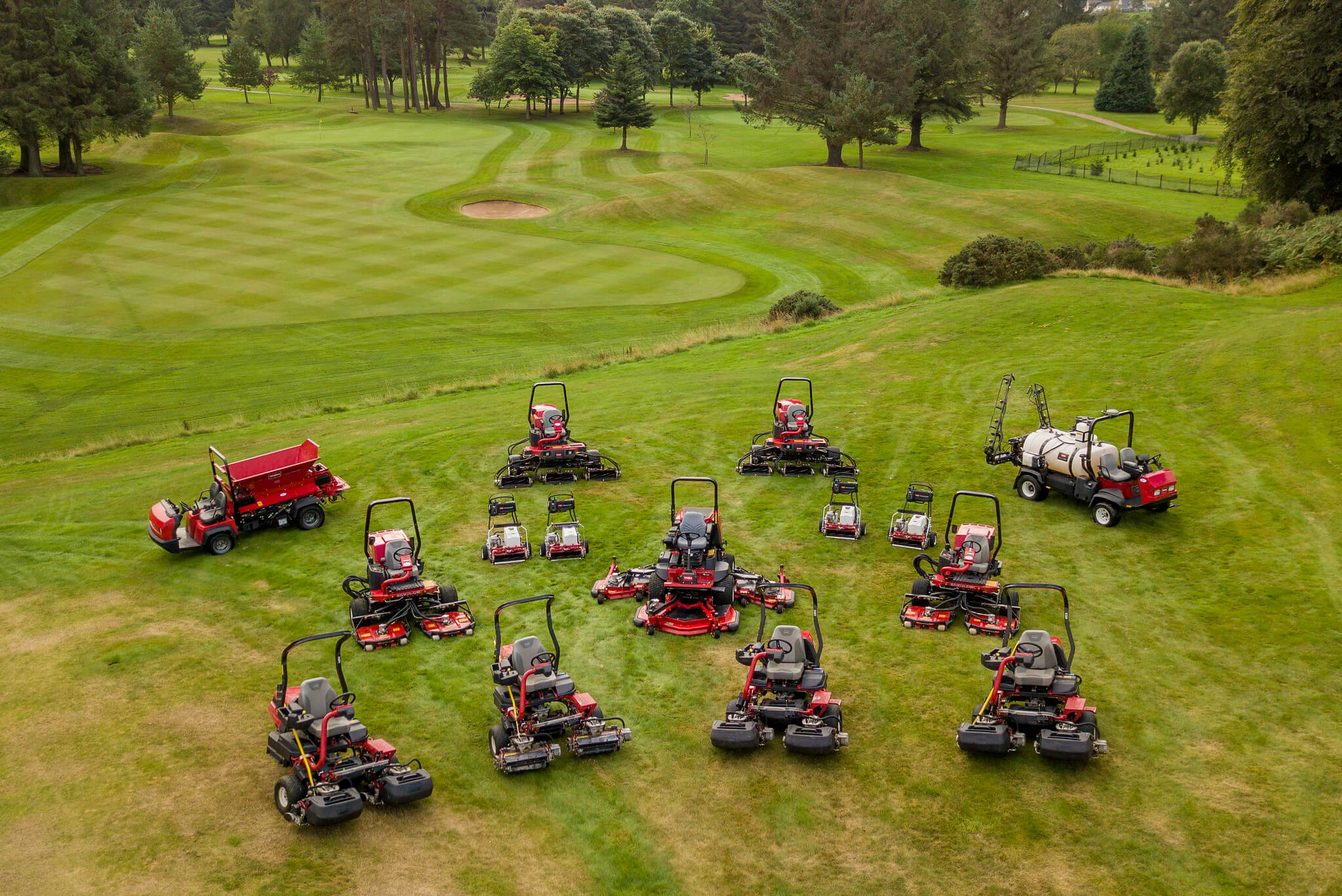 A fleet of Toro machinery on the golf course at Deeside golf club.