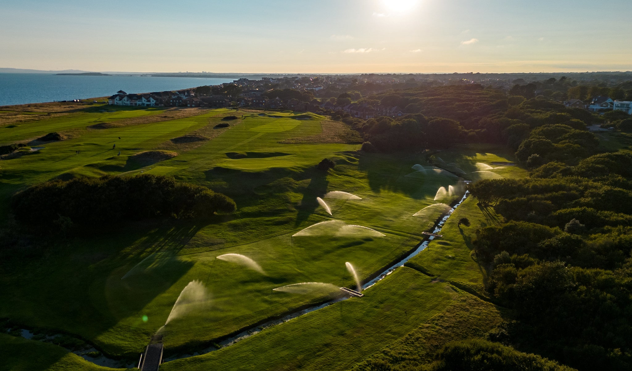 An aerial shot of Barton-on-Sea Golf Club's irrigation system at work.