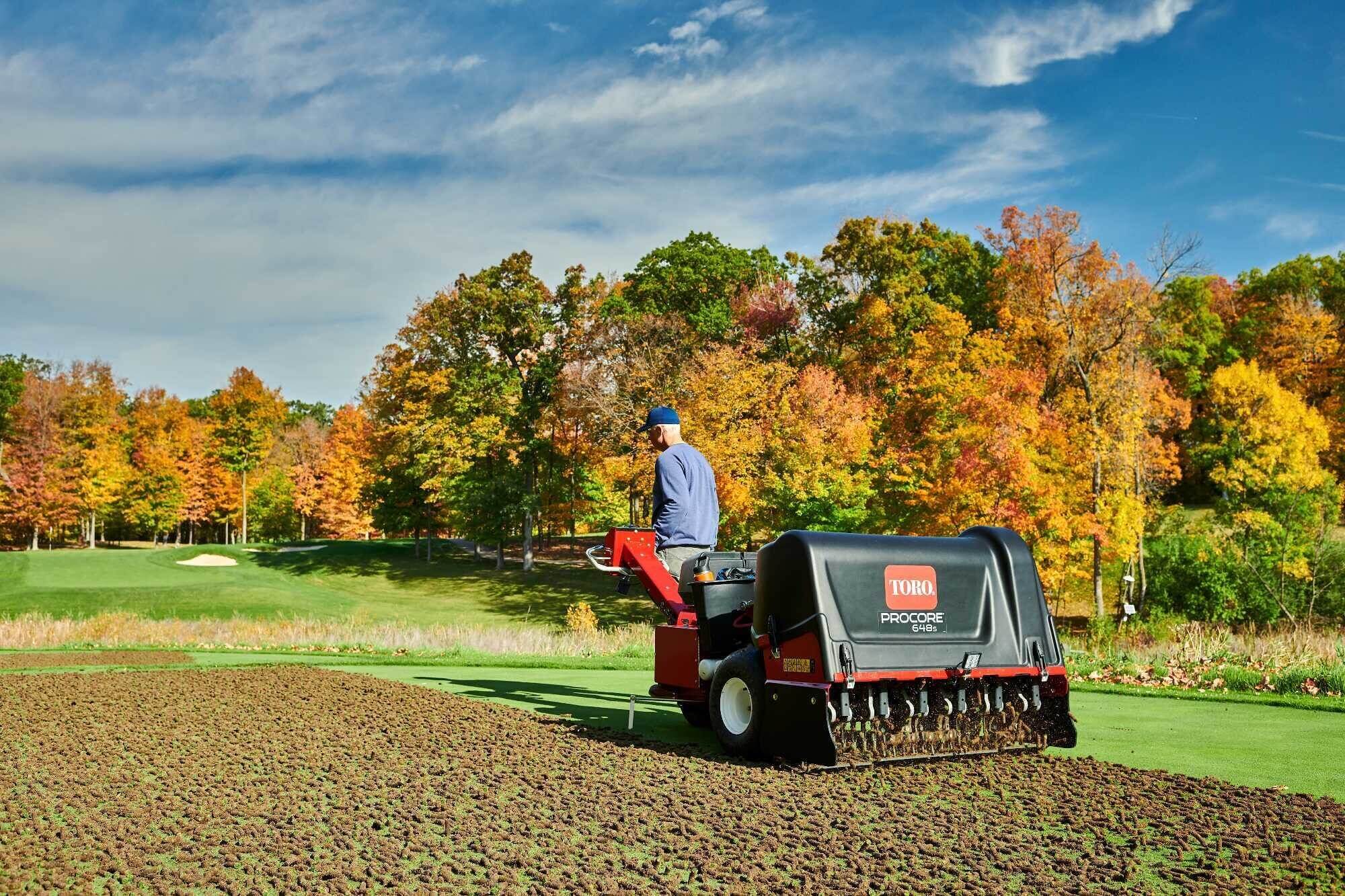 An operator pulling the Toro ProCore 648s across a green. 