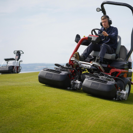 Toro’s Greensmaster eTriFlex 3370 all-electric ride-on greensmower is helping prepare Royal Liverpool for The Open 2023, seen here with assistant greenkeeper, Luke Charnley, who was runner up of the Toro Student Greenkeeper of the Year Young Award 2022.