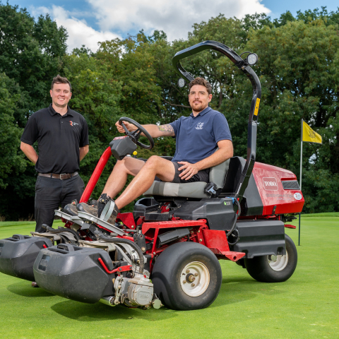 Reesink’s Josh Nash (left) and course manager Josh Thorley with Malden Golf Club’s new all-electric Toro Greensmaster eTriFlex 3370.
