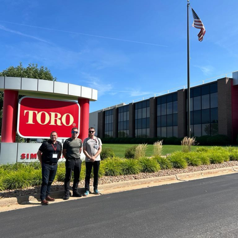From right: 2022 award winner James Gaskell, with his endorser James Crowley and Alastair Rowell from Reesink at Toro Manufacturing.