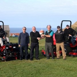 Jim Duncan, left of centre, from IOM Farmers shakes hands with Fred Gray Rowany GC. Also in the photo from left: Simon Miller, head greenkeeper, Mike Kewley, Rowany GC, Mike Atherton, IOM Farmers and Scott Howarth, greenkeeper.