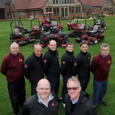 Adrian Hurst, managing director at Tydd St Giles, front right, with Lely’s Julian Copping and the club’s greenkeepers.