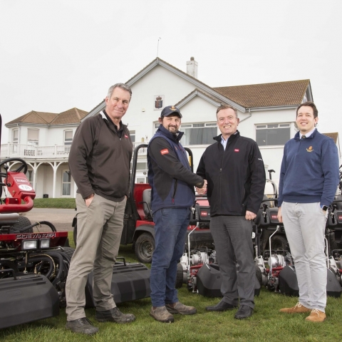 Course manager James Bledge, centre left, shakes hands with Reesink’s Richard Wood, joined by Reesink’s Larry Pearman, left, and Royal Cinque Ports’ James Leah.
