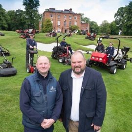 Edgbaston Golf Club course manager Eddie Mills, left, stands with Reesink Turfcare’s Jon Lewis in front of the club’s greenkeeping team and Toro fleet.