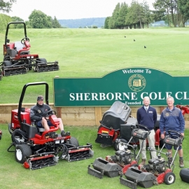 Chris Watson, Sherborne Golf Club course manager, standing right, with Elliot Wellman from Devon Garden Machinery, standing left, with the club’s new Toro machinery.
