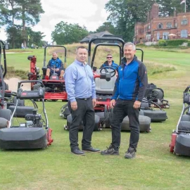 Course manager Chris Godsen, right, stands by Reesink’s Mike Taylor with the greenkeeping team and some of the club’s new fleet.