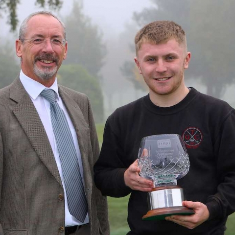 Trentham Golf Club’s Tom Bromfield, right, is presented the trophy for winning the Young Student Greenkeeper of the Year Award from sponsor Reesink Turfcare’s David Cole.