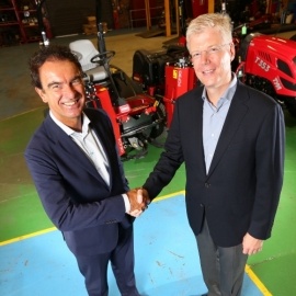 Gerrit van der Scheer, CEO of Royal Reesink, left, shakes hands on the acquisition of Lely Turfcare with CEO of Lely Holding Alexander van der Lely.