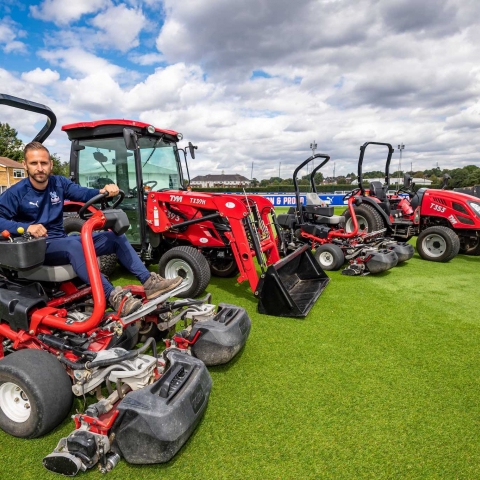 Assistant head groundsman Dean Waters with the Toro fleet at Crystal Palace Training Ground.