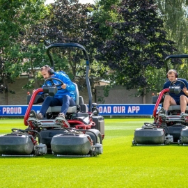 Assistant head groundsman Dean Waters, left, and senior groundsman Charlie Buck in action on the club’s Toro machines.