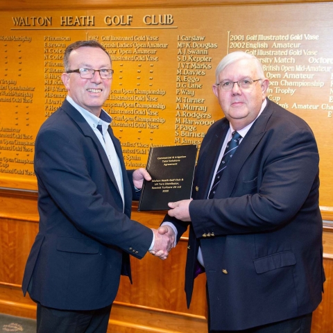 Reesink’s Larry Pearman, left, shakes hands with Dr Alastair Wells at Walton Heath Golf Club.
