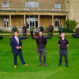 Course manager Karl Williams, centre, with Reesink reps David Timms, left, and Daniel Tomberry, and the club’s Toro fleet and greenkeeping team in the background.