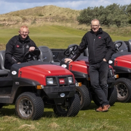 Gullane’s course manager Stewart Duff (left) and Reesink Turfcare rep Neil Mackenzie with the club’s new five Toro Workman GTX Lithium-Ion utility vehicles.