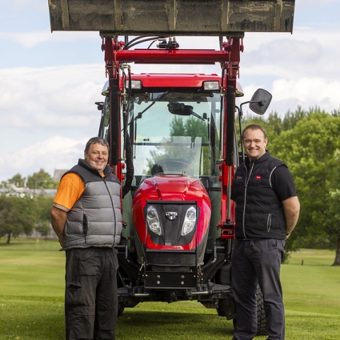 Head greenkeeper Rab Burns from Bathgate Golf Club (left) and Reesink’s Gareth Rogers posing with TYM’s T555 tractor.