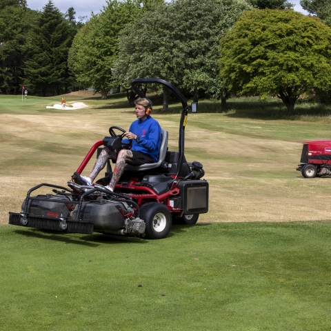 A couple of the club's Toro machines in action.