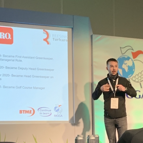 Success has followed Danny Patten, seen here speaking at BTME 2023, since winning the Toro Young Student Greenkeeper of the Year Award in 2018.
